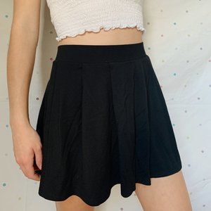 black pleated skirt
